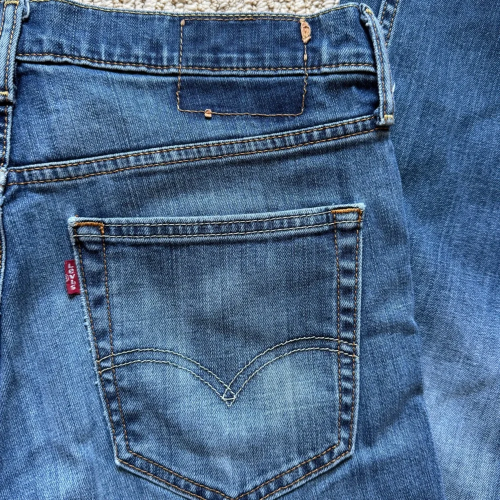 Levi's Distressed Blue Denim Straight Leg Red  Tag Jeans